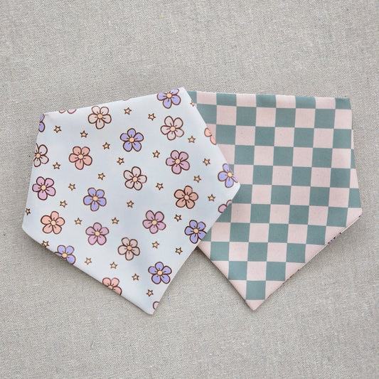 Two fabric bands with floral and checkered patterns on a gray background